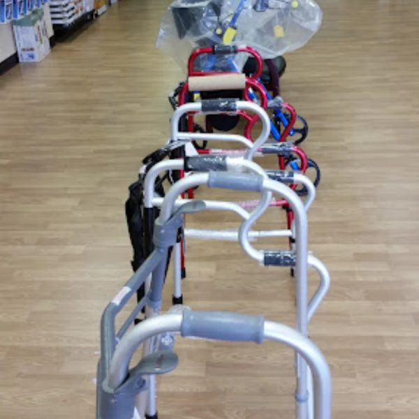 Row of folding walkers on the showroom floor at A & Z Medical Supplies